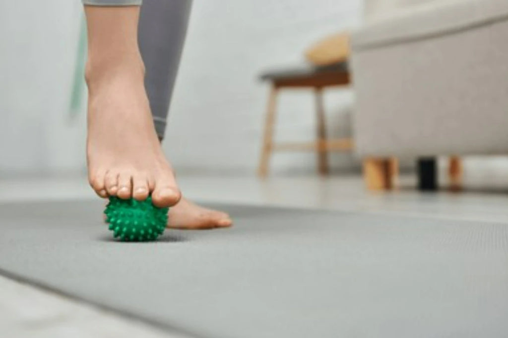 massage feet with golf ball