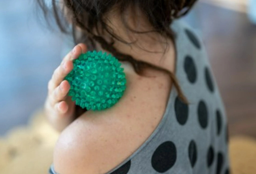 tennis ball massage for back pain