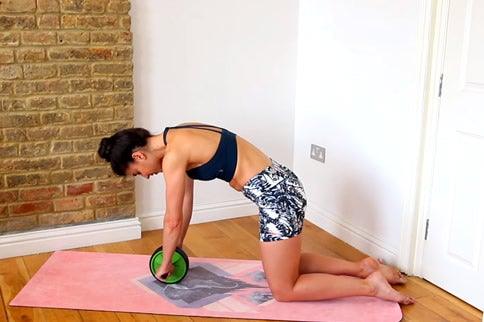 Can I reduce my stomach by using an ab roller? - FitBeast